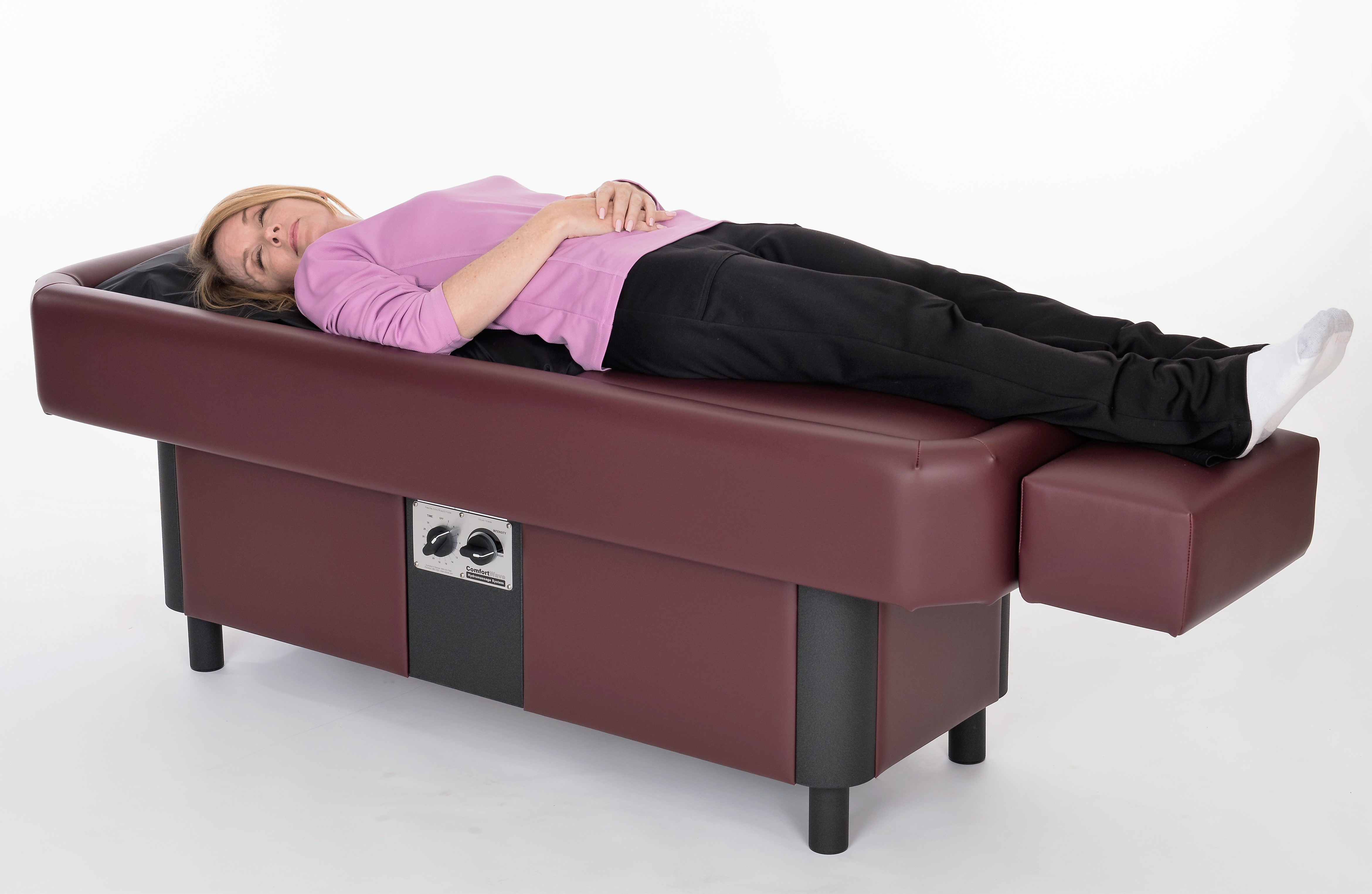 lady laying on ComfortWave hydromassage table